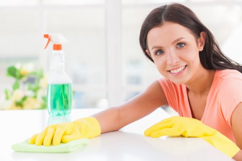 Technician preparing a carpet cleaning job with safety equipment in SE10