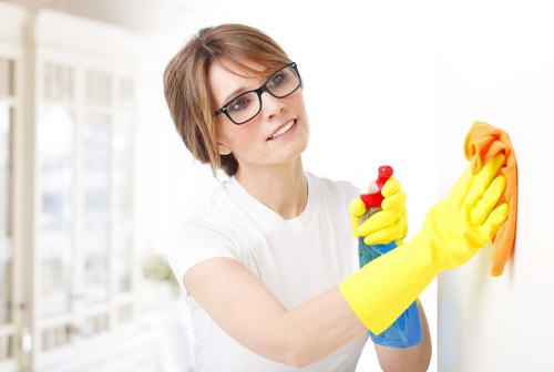 Carpet cleaning staff preparing a safe workspace with equipment checks